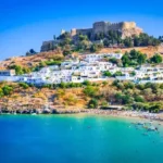 Lindos village and Acropolis during East Coast Tour in Rhodes Greece with sea view and white houses